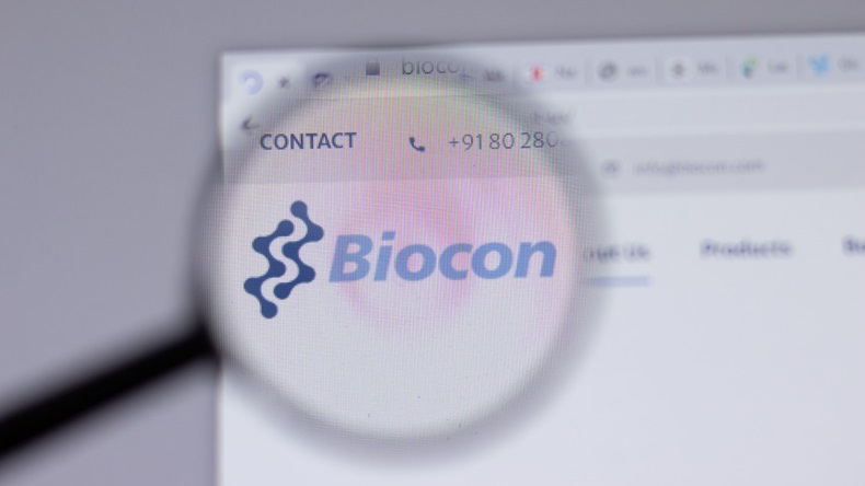 Biocon logo under magnifying glass