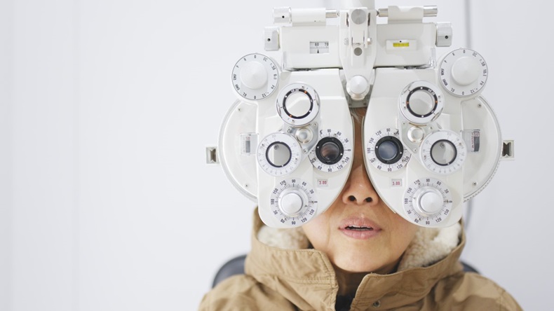 Older woman undergoes eye test