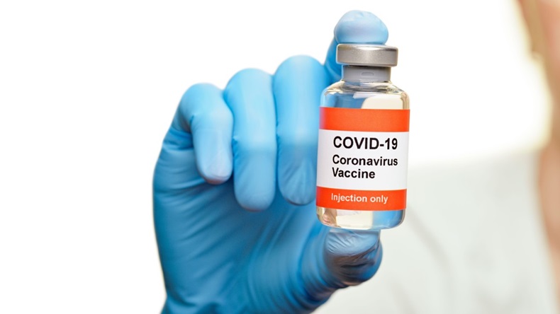 COVID vaccine hand
