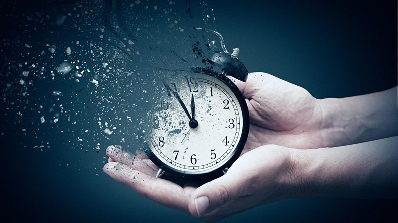 Clock disintegrates, time running out concept