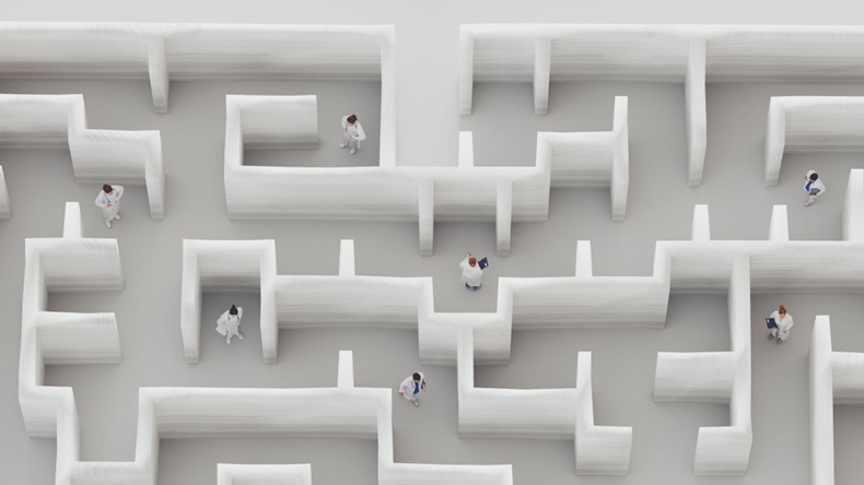 Doctors In A Maze With White Walls