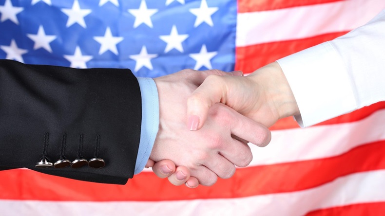 USA Flag Handshake Business Deal