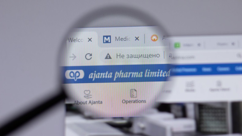 Ajanta Pharma company logo icon under magnifying glass