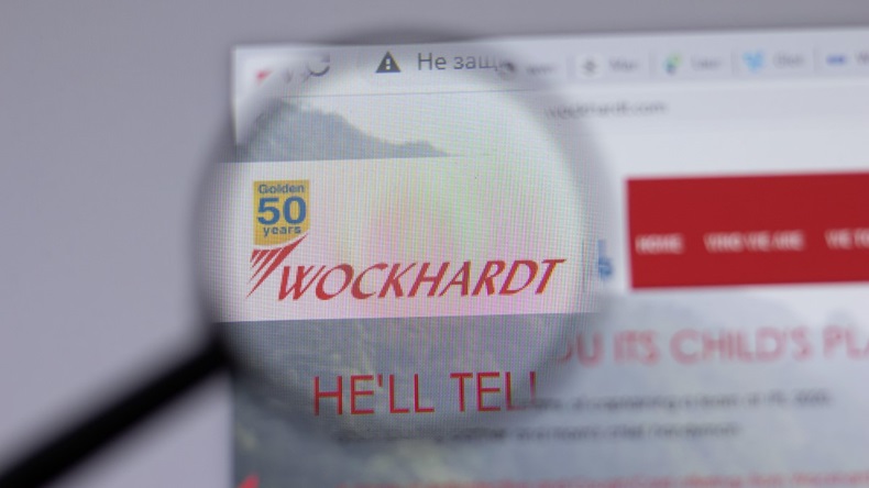 Wockhardt company logo icon on website under magnifying glass
