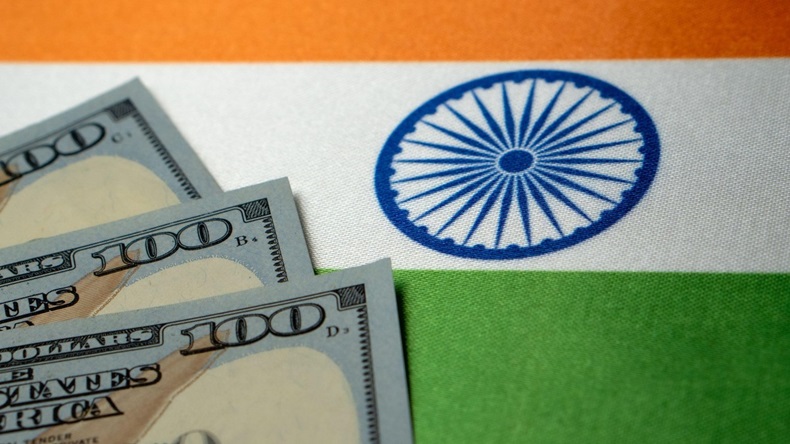 Indian national flag with dollar bills