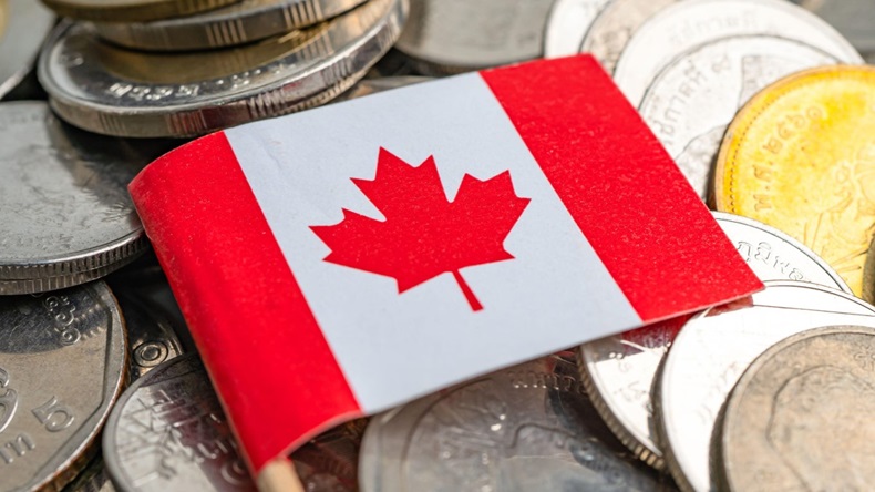 Canadian flag on stack of coins