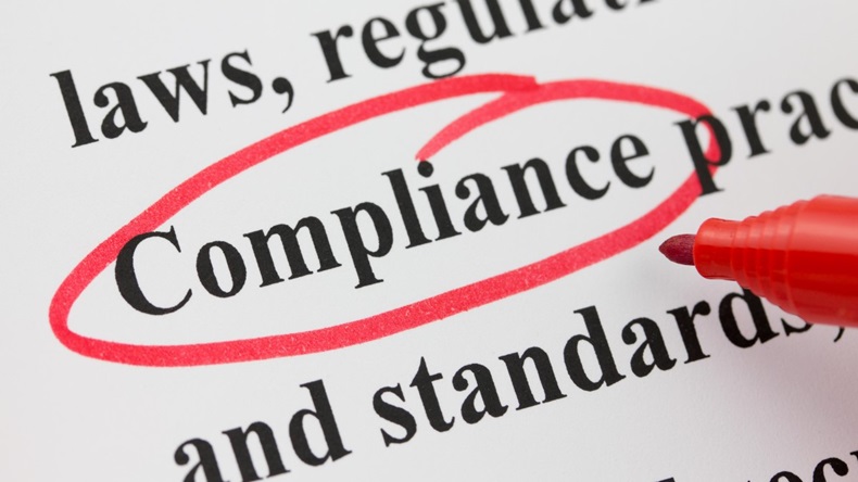 Compliance word circled red pen