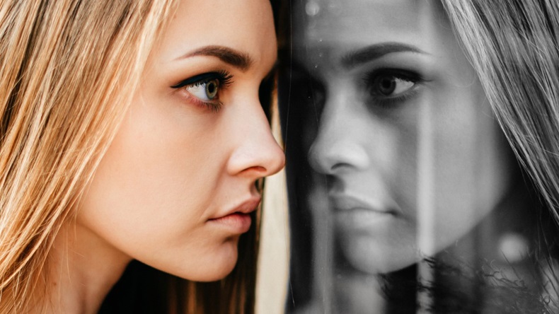 Woman eyes face reflection mirror