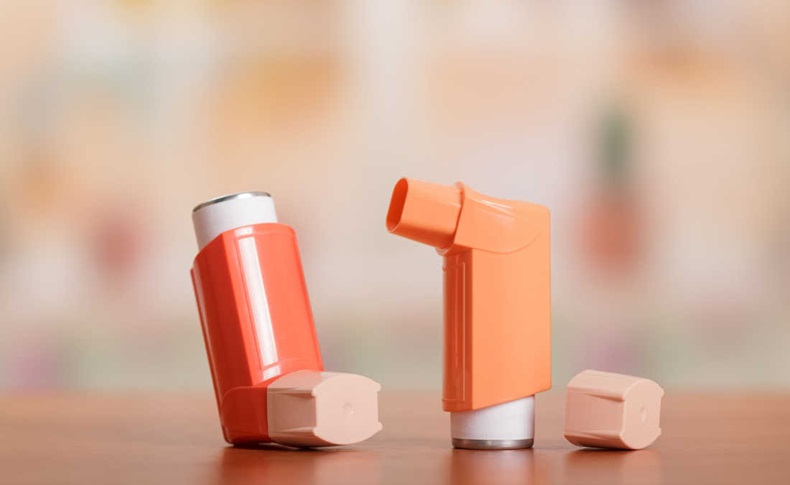 Two inhalers on a table