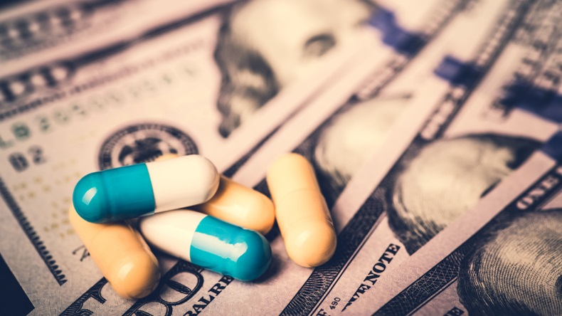 Medicine capsules on top of money