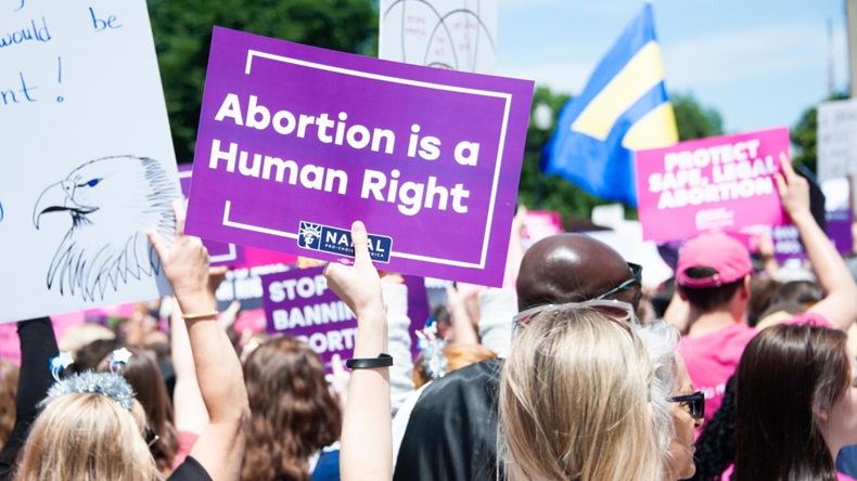 Protest sign reading 'Abortion is a Human Right'