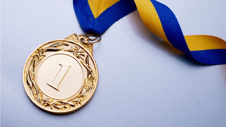 Gold medal bearing the number one, winner's medal