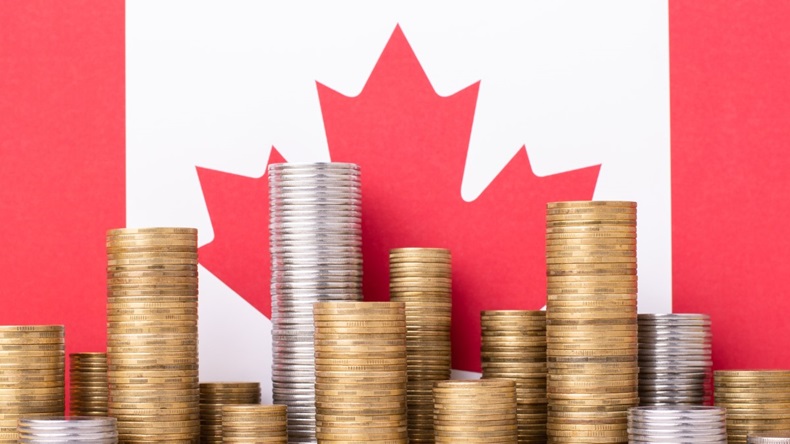 Canadian flag with piles of coins, money