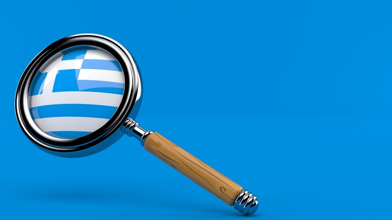 Magnifying glass with image of Greek flag