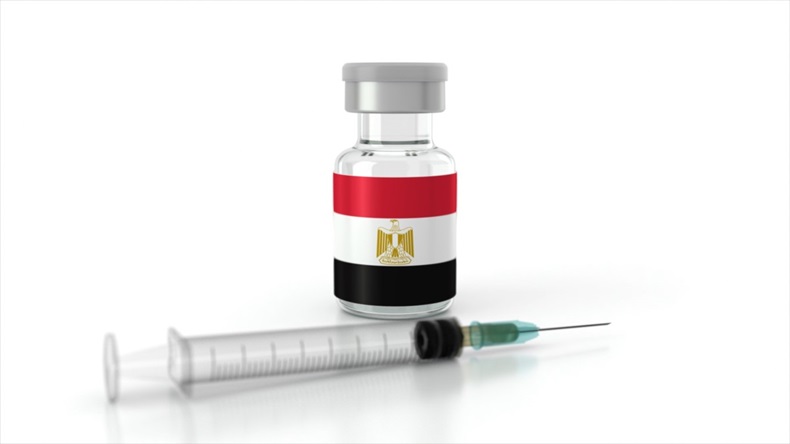 Syringe and vial labelled with Egyptian flag