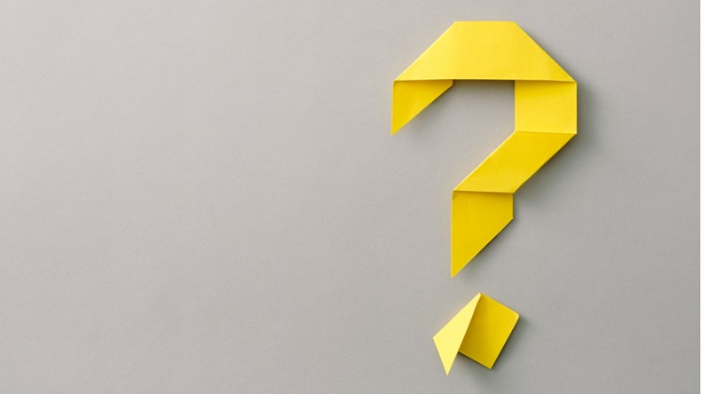 Yellow question mark on grey background