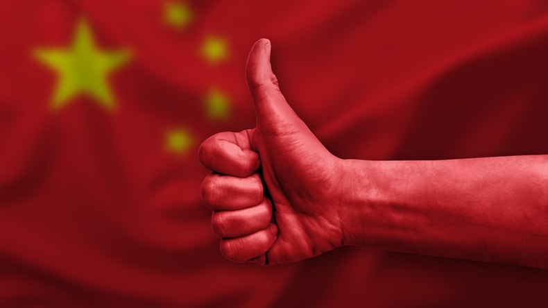 Red Hand Giving Thumbs Up With China Flag In Background