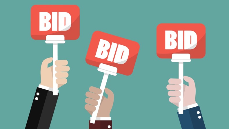 Multiple bidders - hands holding "bid" signs