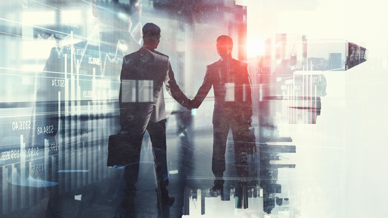 Mixed media image showing two men shaking hands superimposed over a cityscape