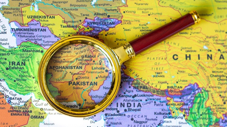 Pakistan and Afghanistan under magnifying glass on map