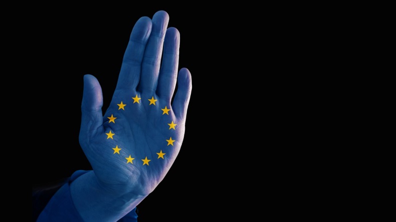 Hand with EU flag making stop gesture