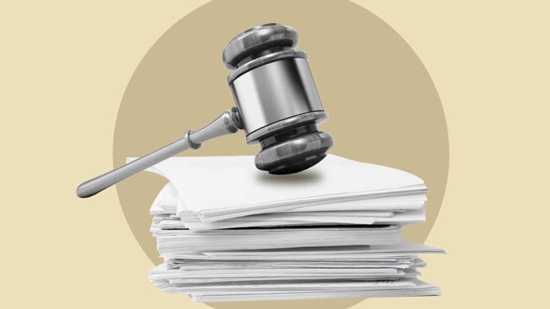 Illustration of a gavel on court documents 