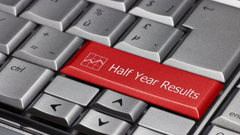 Half year results written on a keyboard key