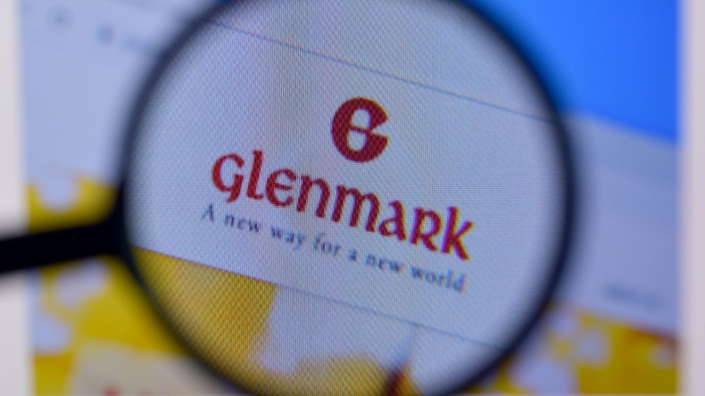 Glenmark logo on website under magnifying glass